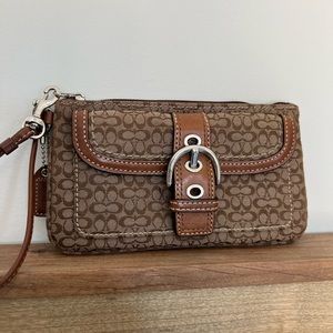 COACH signature wristlet clutch leather and fabric jacquard canvas logo material